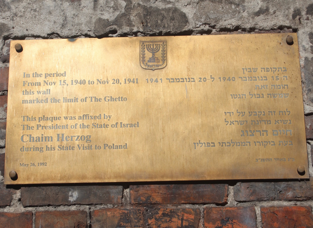 Memorial plaque to Jewish Ghetto Uprising, on a small section of the Ghetto wall still standing, Warsaw, Poland
